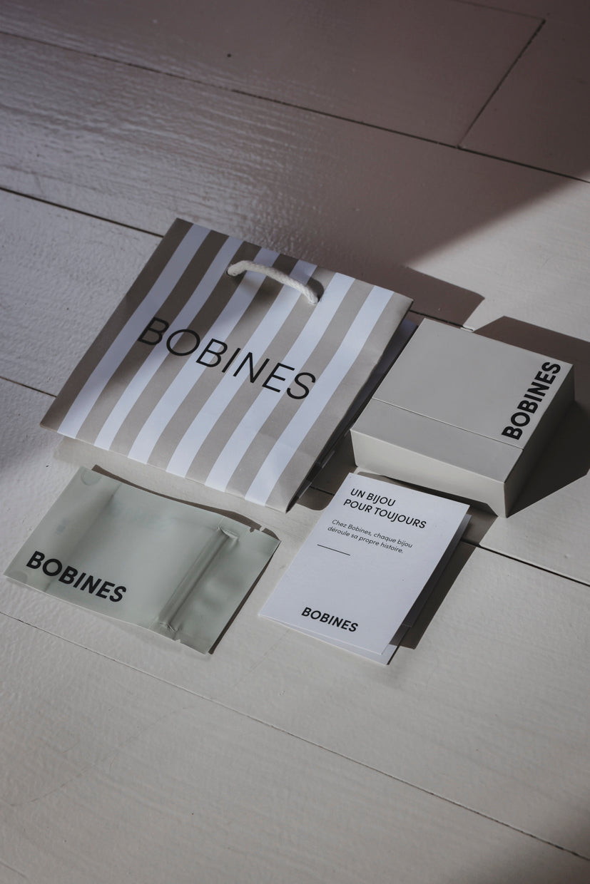 Coffret de collier avec boîtes BOBINES noires et grises, étuis assortis