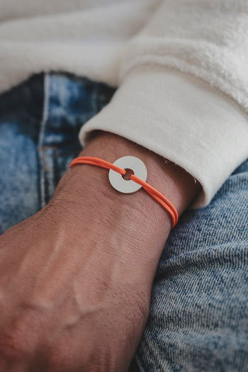 Bracelet La Cible en cordon orange et médaillon rond argent 925