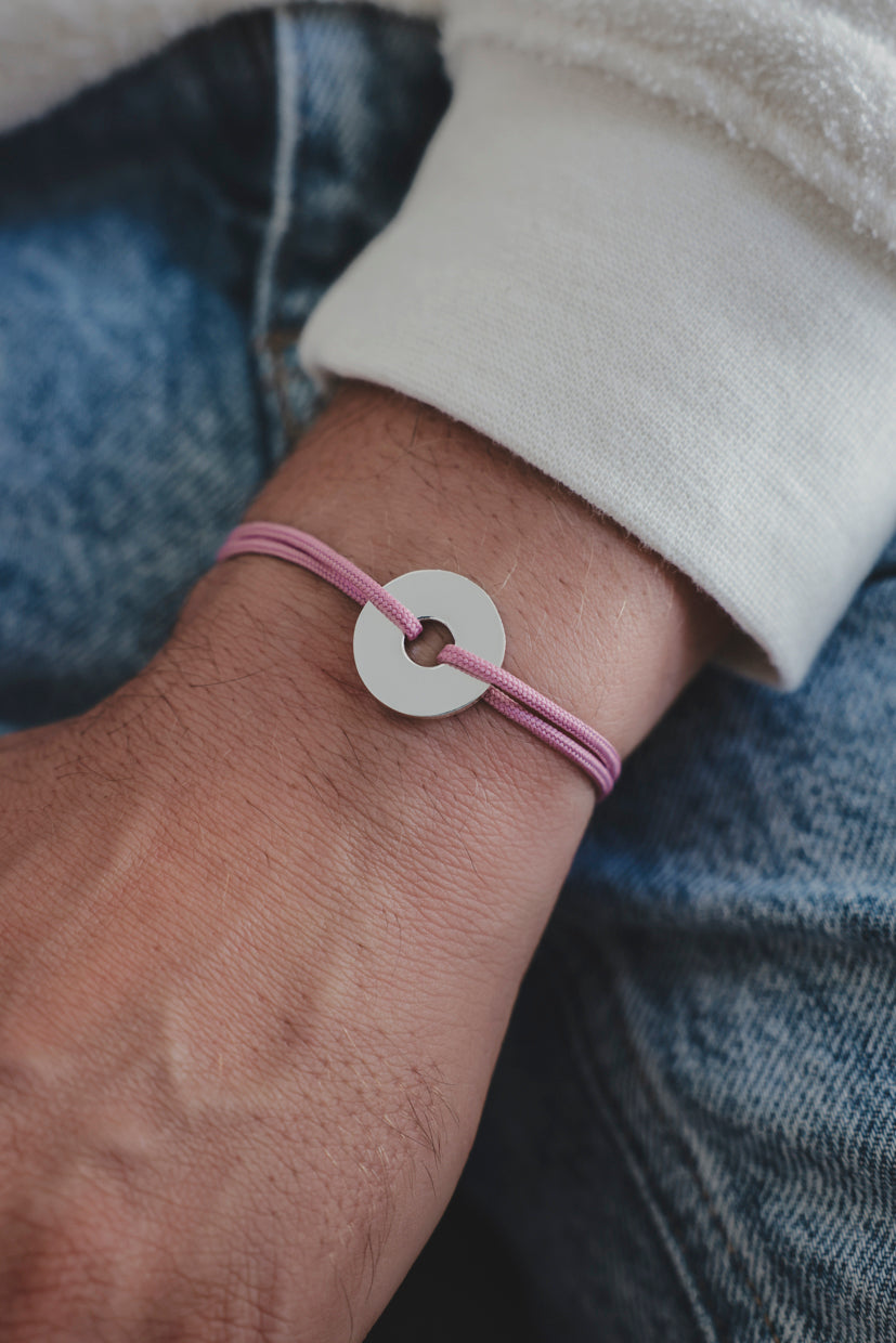 Bracelet La Cible en argent 925, cible ronde et cordon paracorde rose fluo